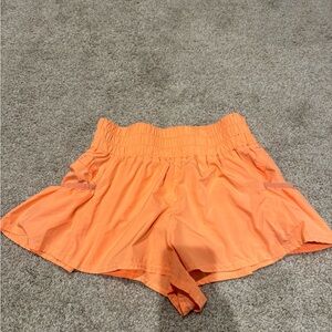 Get Your Flirt on Shorts by Free People Movement, Color: Melon